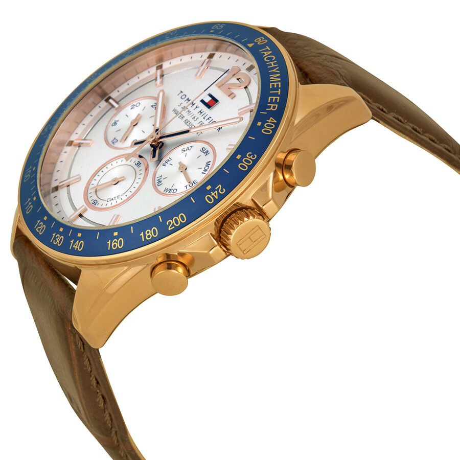 Side profile of Tommy Hilfiger Luke watch showing gold-tone case and brown leather band