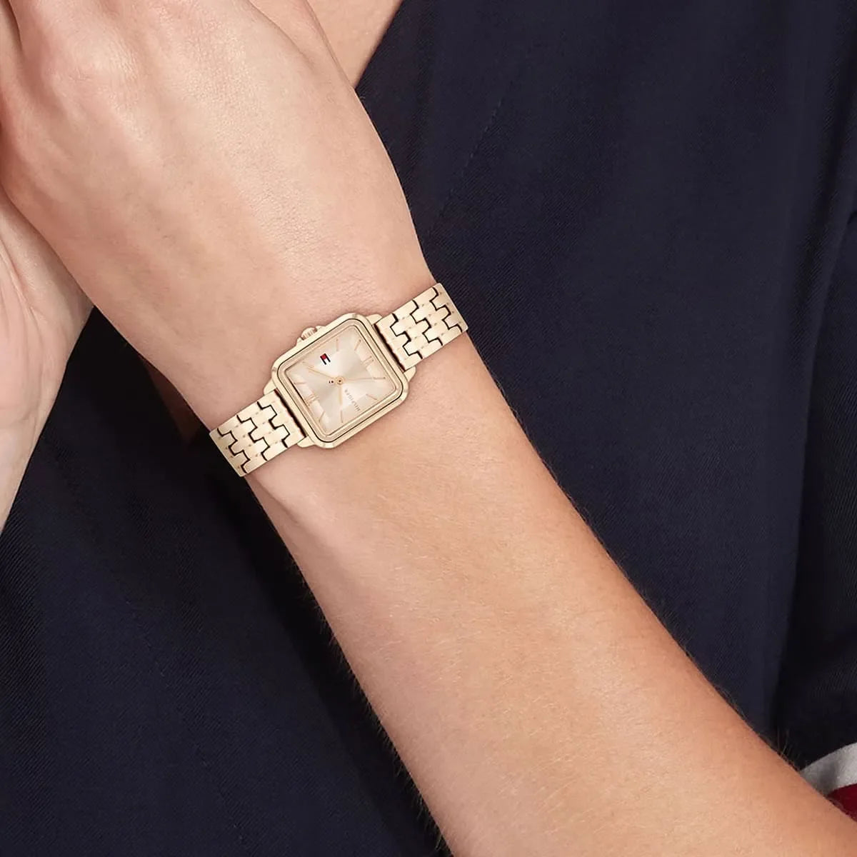 Tommy Hilfiger Mia rose gold square watch worn on wrist, detail view
