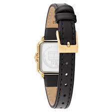 Back view of Tommy Hilfiger Mia watch case showing white caseback and black leather strap