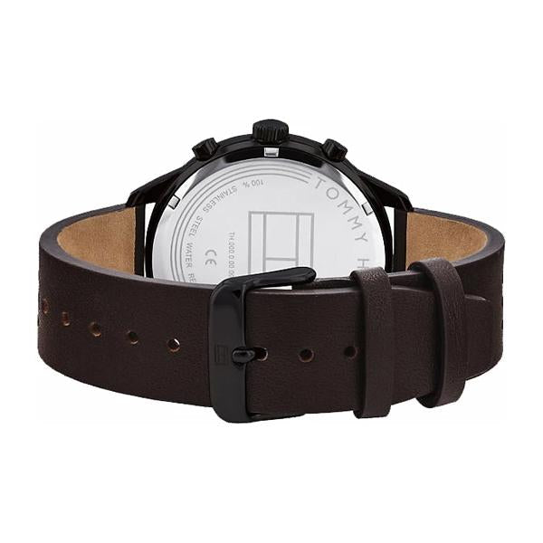 Tommy Hilfiger watch caseback showing silver case back and brown leather strap with buckle