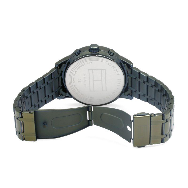 Tommy Hilfiger watch displayed case back view with adjustable olive green and gold-tone metal band