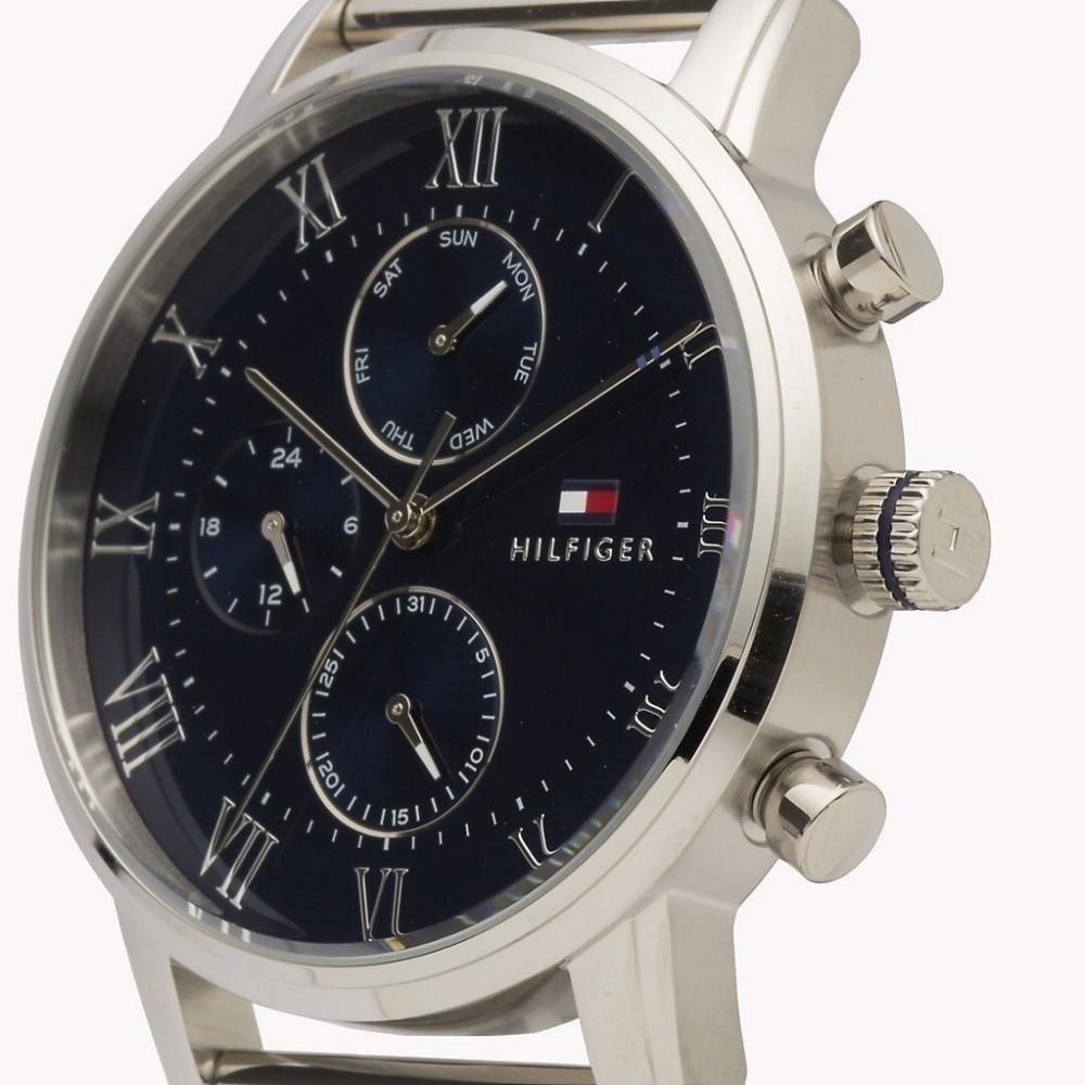 Side angle view of Tommy Hilfiger chronograph with stainless steel case and visible crown and pushers
