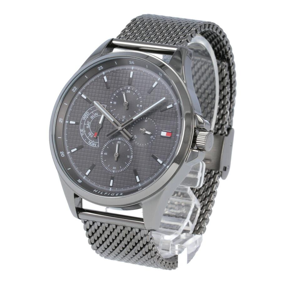 Tommy Hilfiger Shawn watch angled view showing grey dial and black mesh strap