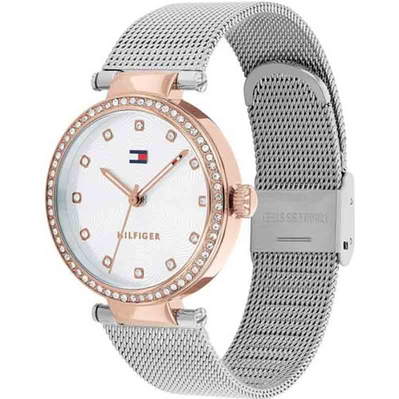 Three-quarter view of Tommy Hilfiger Sport Lux watch showing white dial, rose gold case, and mesh strap