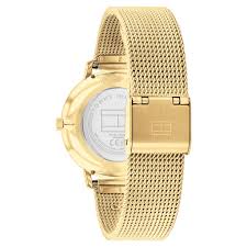 Tommy Hilfiger TEA gold watch caseback showing mesh strap closure