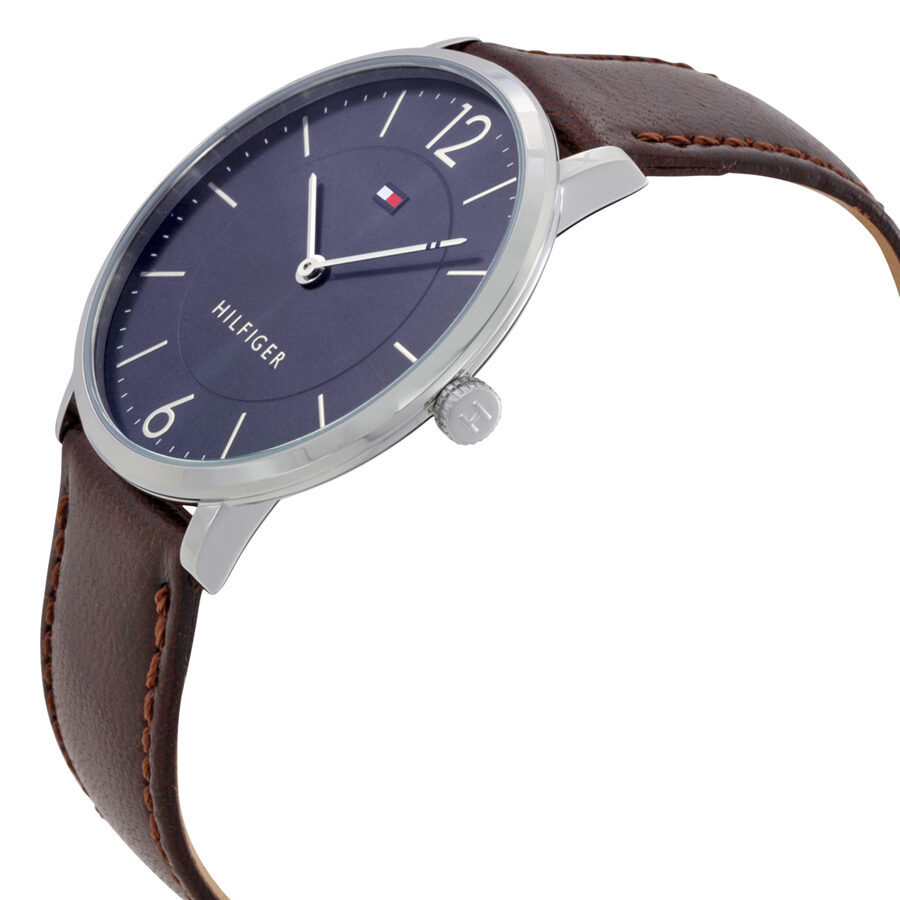 Side angle view of Tommy Hilfiger Ultra Slim watch showcasing slim profile and brown leather strap