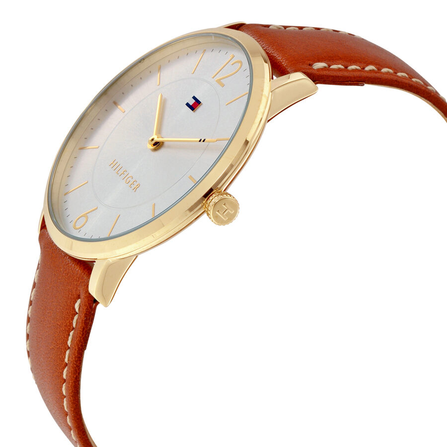 Tommy Hilfiger Ultra Slim watch angle view showing gold case profile and brown leather strap