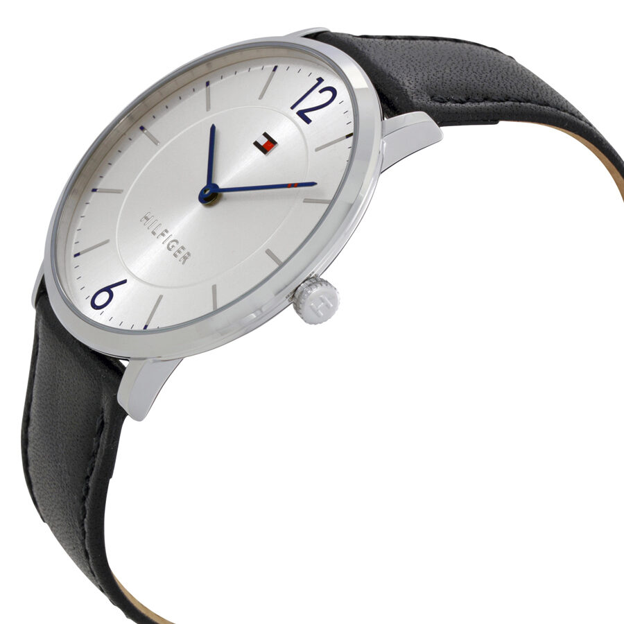 Tommy Hilfiger watch angled view showing silver dial and black leather strap