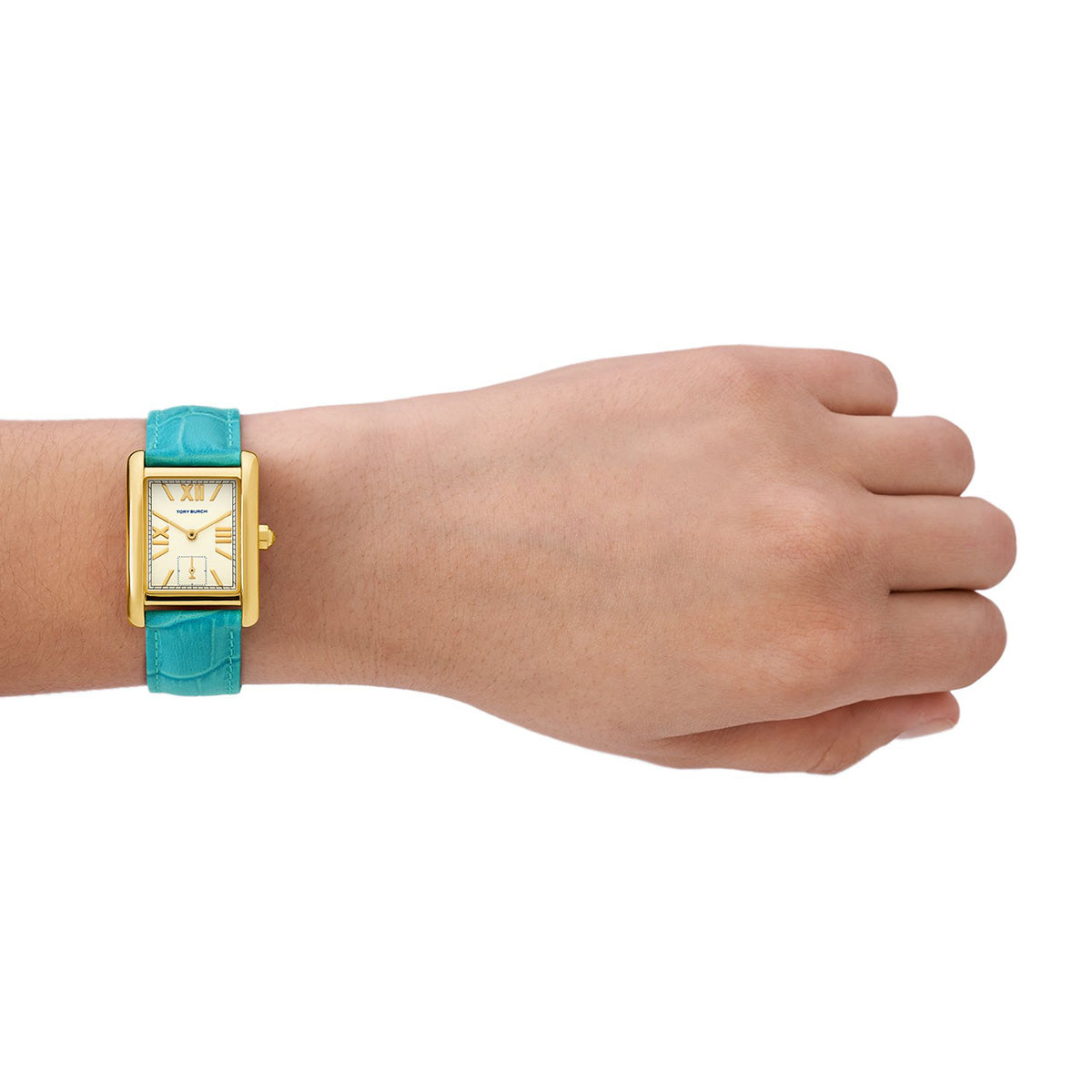 Tory Burch Tank women's watch with turquoise leather band worn on wrist