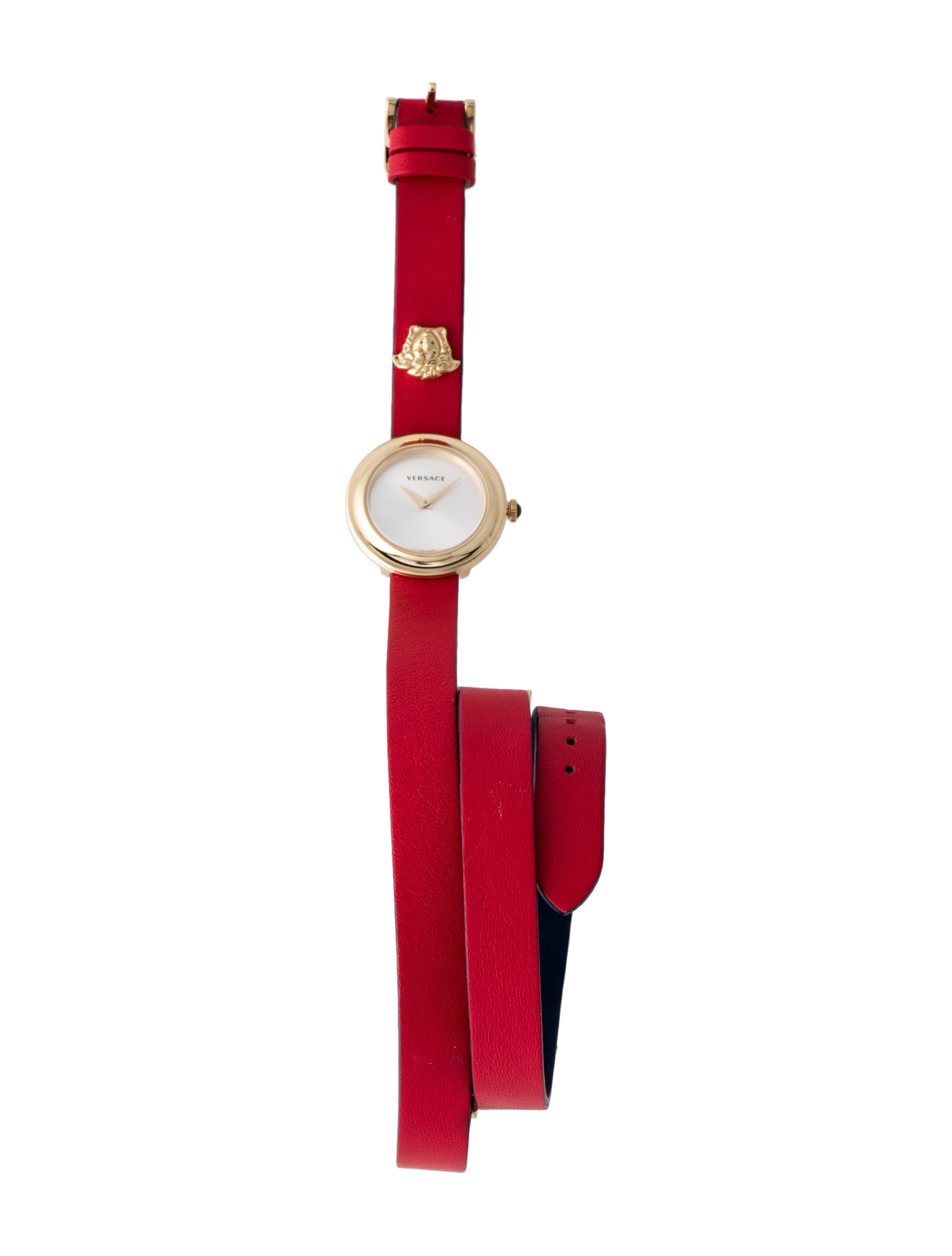 Versace V-Flare women's watch with silver dial and red leather strap worn on wrist