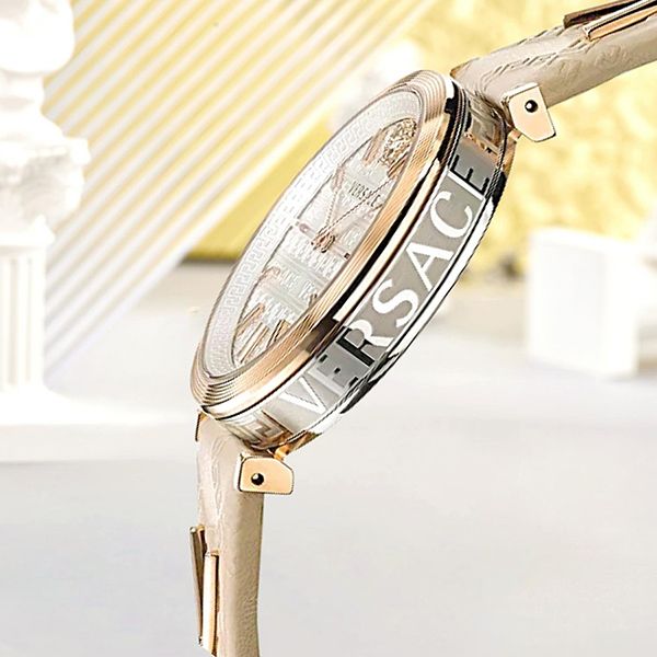 Versace V-Twist watch at angle showing white dial, rose gold case, and white leather strap detail