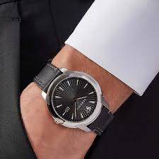 Versace V-Urban watch worn on wrist showing black dial and stainless steel case