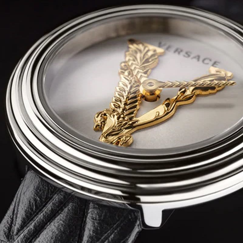 Close-up of Versace Virtus Mini dial with gold Medusa logo and hand details