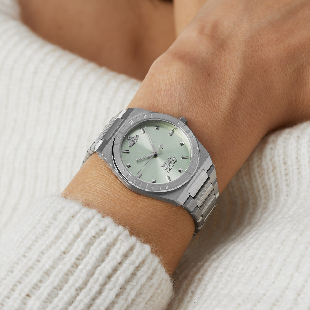Vivienne Westwood Charterhouse watch worn on wrist with green dial visible