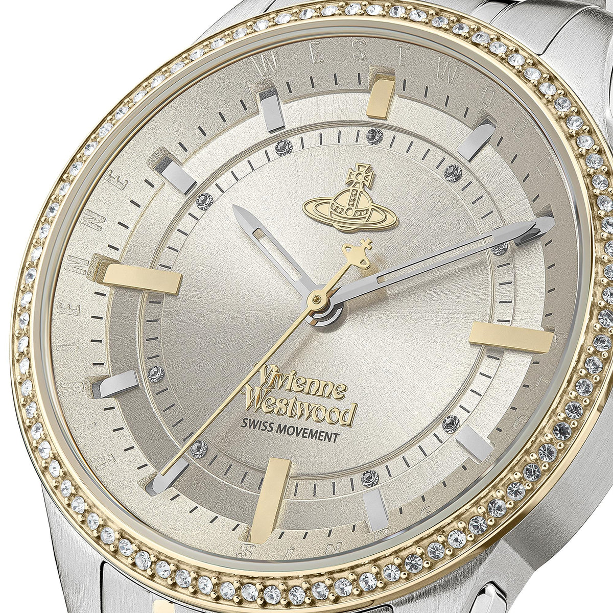 Close-up of Vivienne Westwood East End dial featuring gold-tone markers, Westwood branding and Swiss movement text