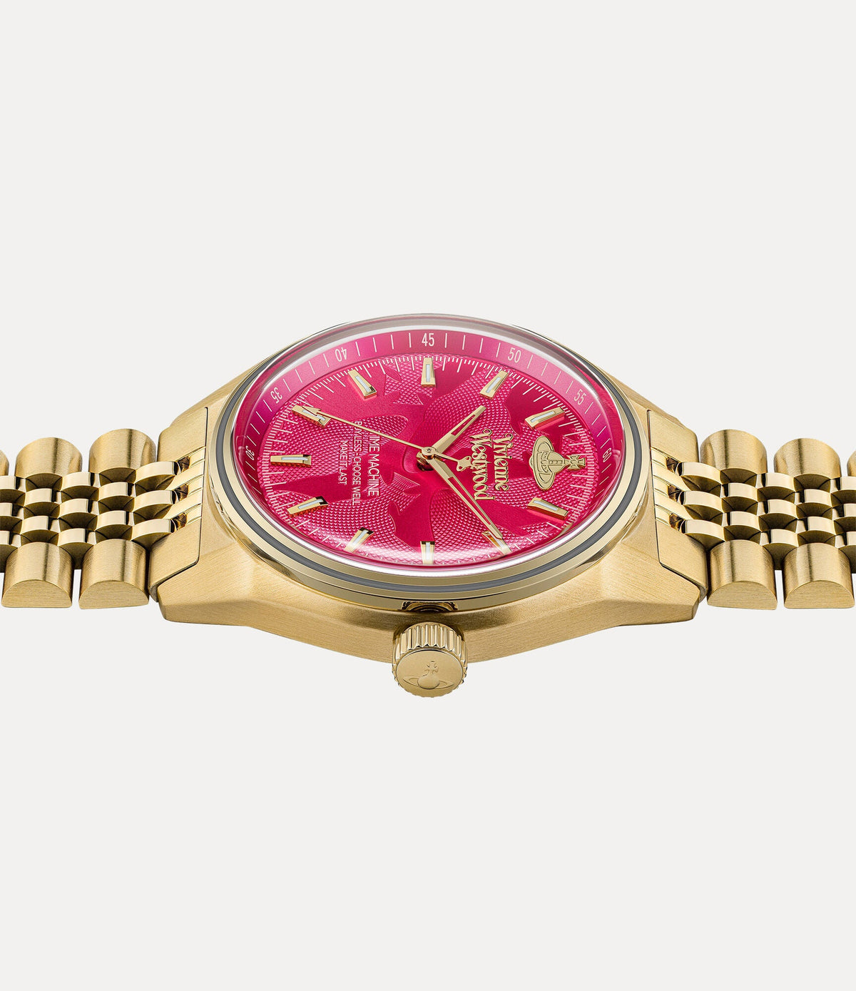 Close-up detail of hot pink dial featuring Vivienne Westwood branding and Time Machine text