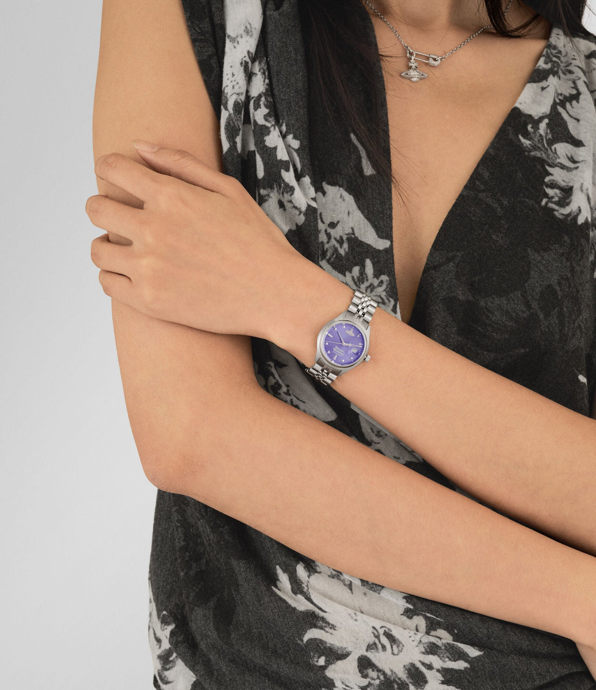 Vivienne Westwood Little Camberwell watch with purple dial on woman's wrist