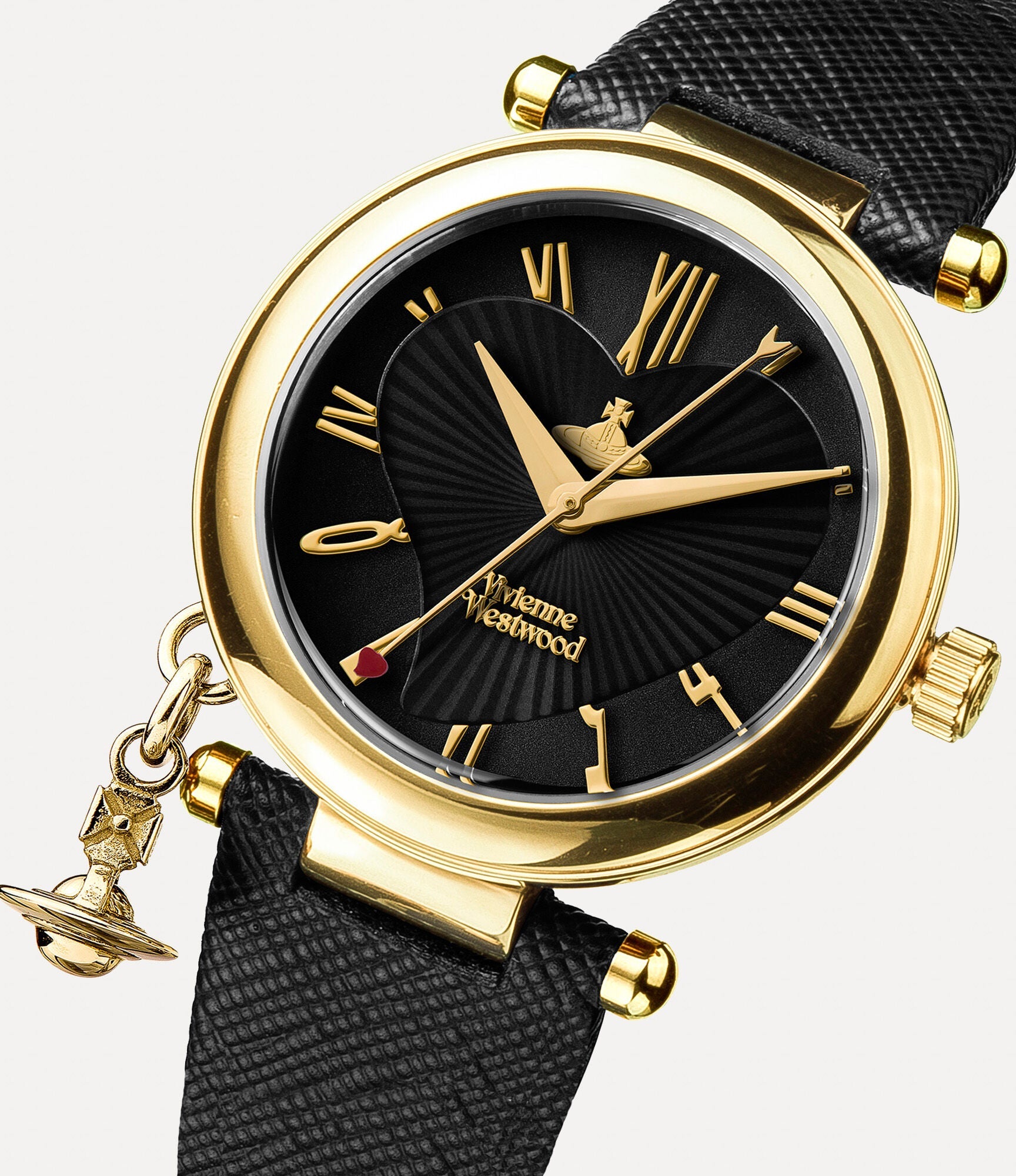Vivienne Westwood Orb watch angled view showing gold case, black sunray dial, and orb pendant