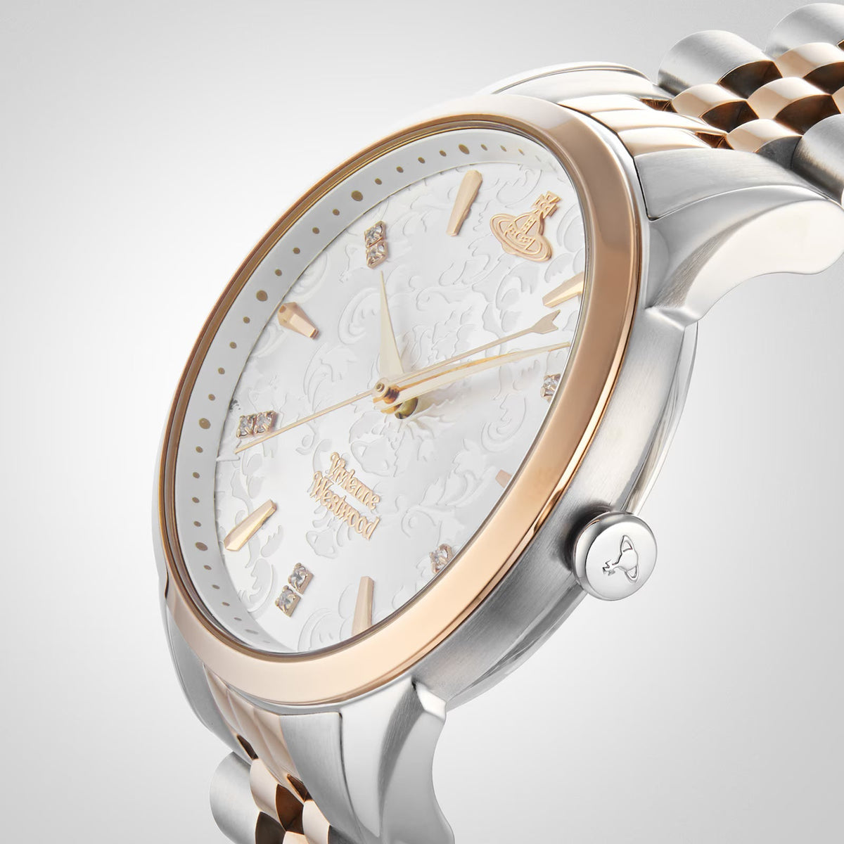Vivienne Westwood Wallace watch on wrist showing 37mm case with rose gold bezel and white dial with Orb detail