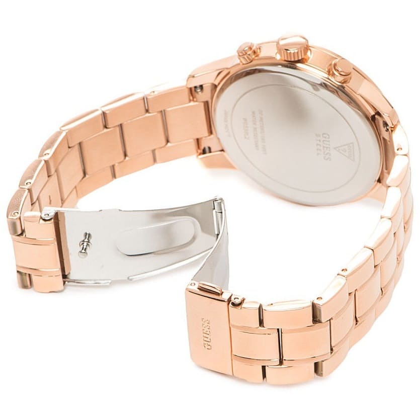Side view of Guess Sunrise rose gold watch showing profile and deployment clasp