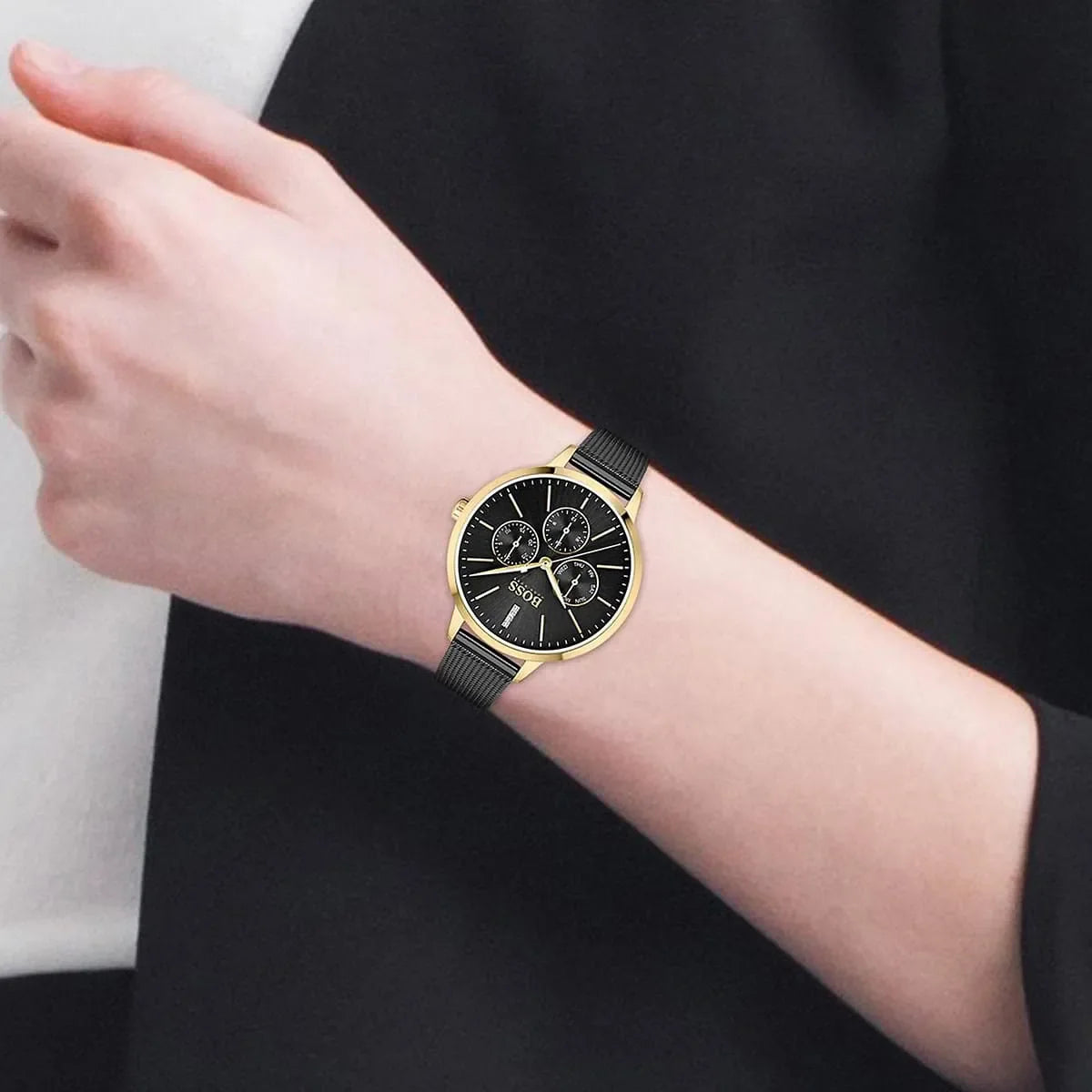 Hugo Boss Symphony watch on wrist with black mesh bracelet and three chronograph sub-dials visible