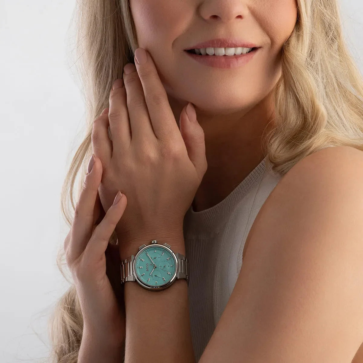 Hugo Boss Candor women's watch with turquoise dial worn on wrist