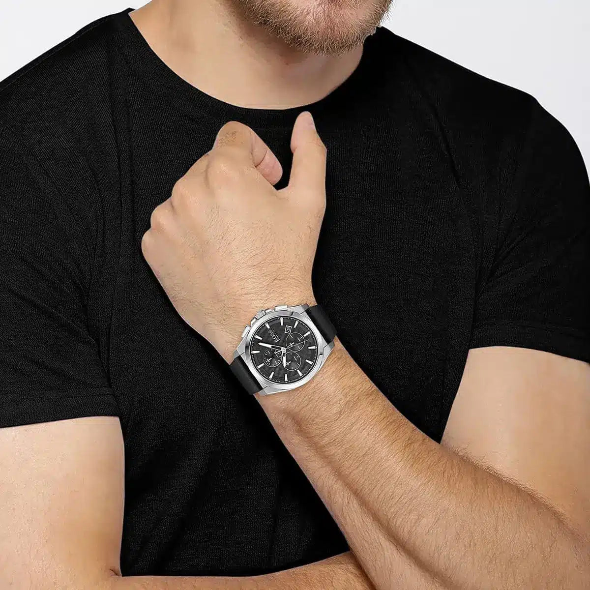 Hugo Boss Grandmaster watch on male wrist wearing black t-shirt