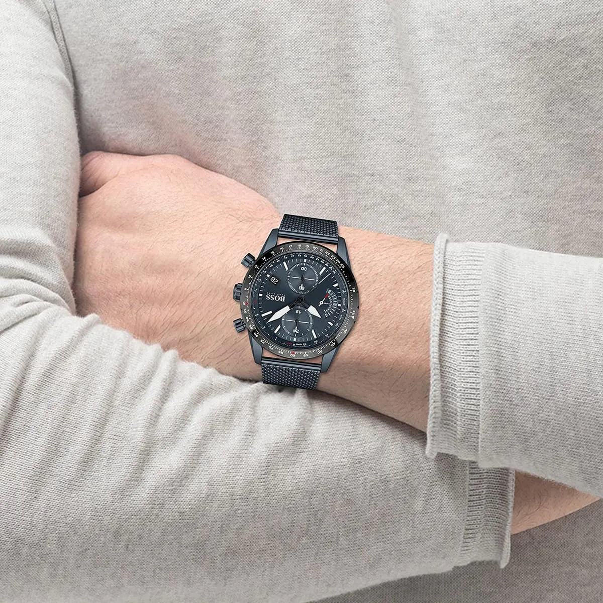 Hugo Boss Pilot Edition chronograph watch on wrist with blue mesh bracelet