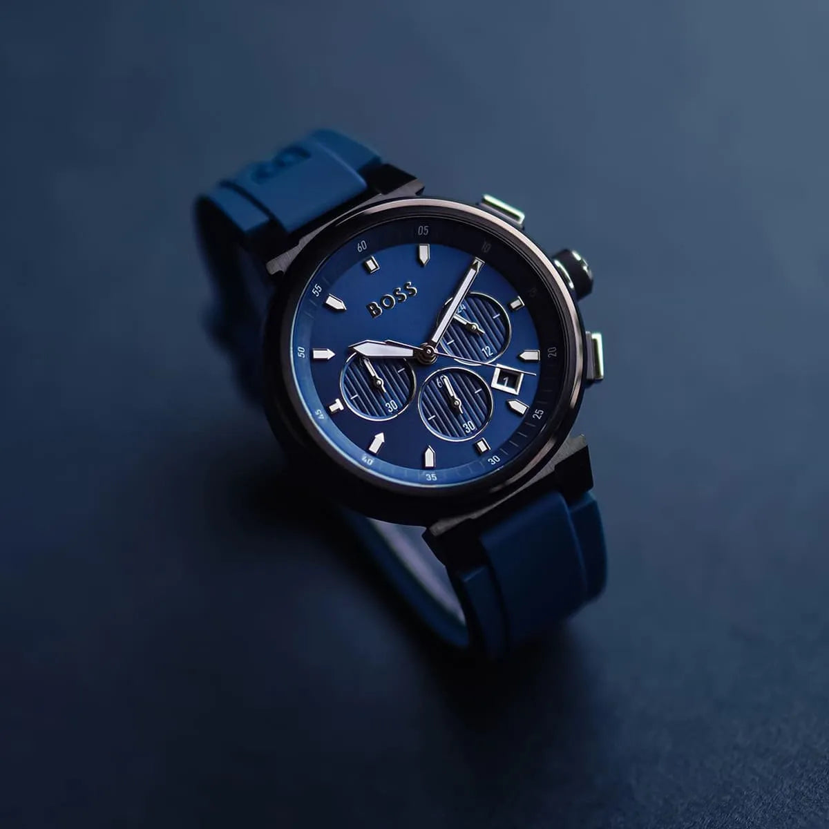 Hugo Boss P-Lux chronograph men's watch with blue dial on dark surface