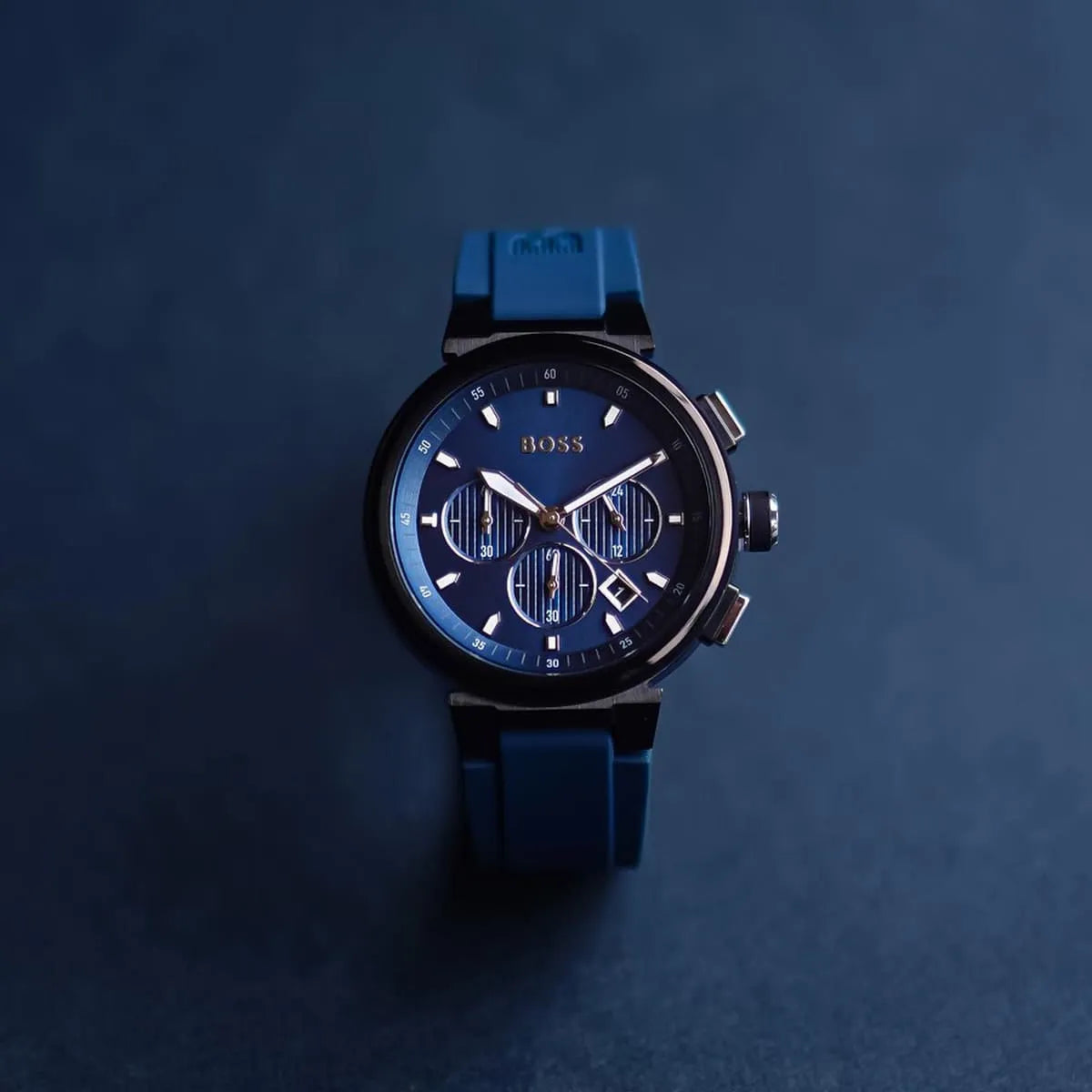 Hugo Boss P-Lux chronograph watch in blue tones on dark blue background