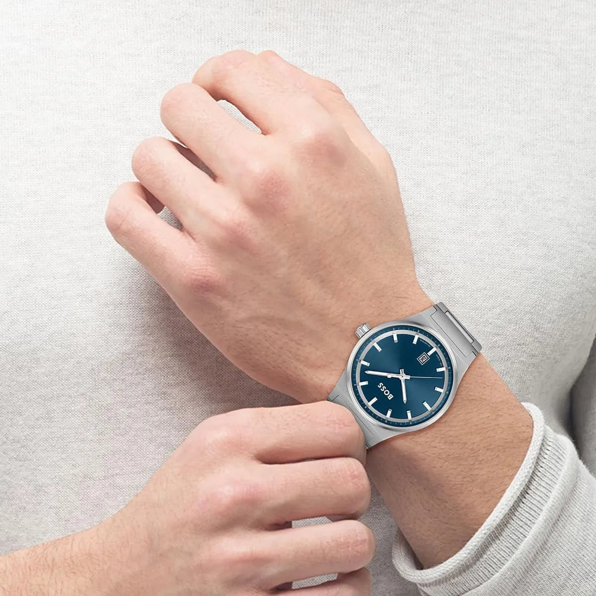 Hugo Boss Candor blue dial watch on wrist in casual setting