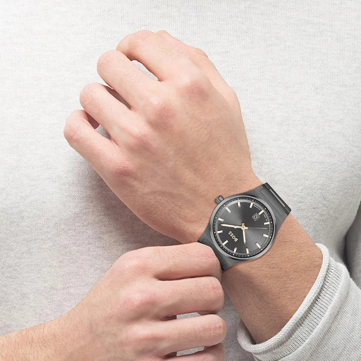 Hugo Boss Candor men's watch worn on wrist with gray sunburst dial