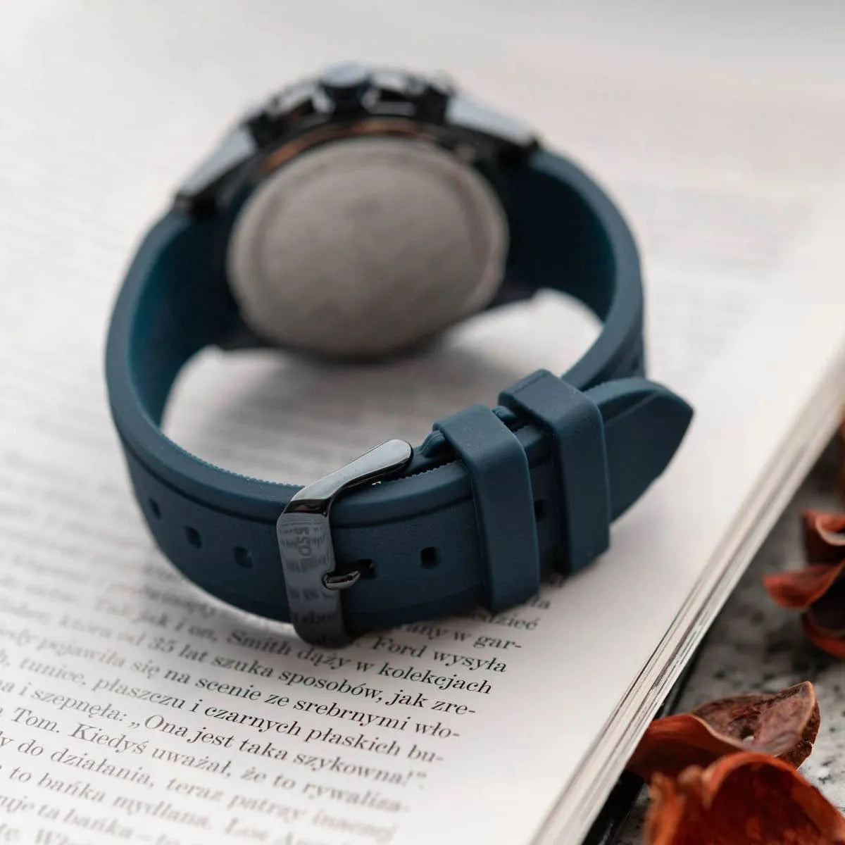 Hugo Boss Runner watch side view with blue silicone strap and metal buckle