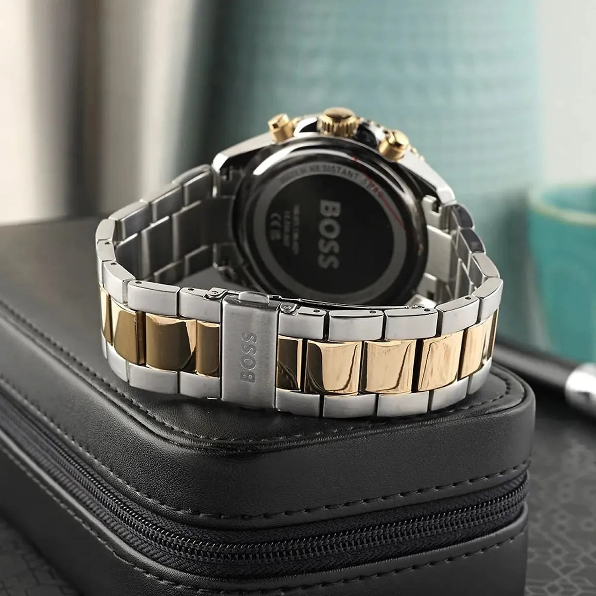 Hugo Boss Runner Chronograph watch on black leather case showing caseback detail