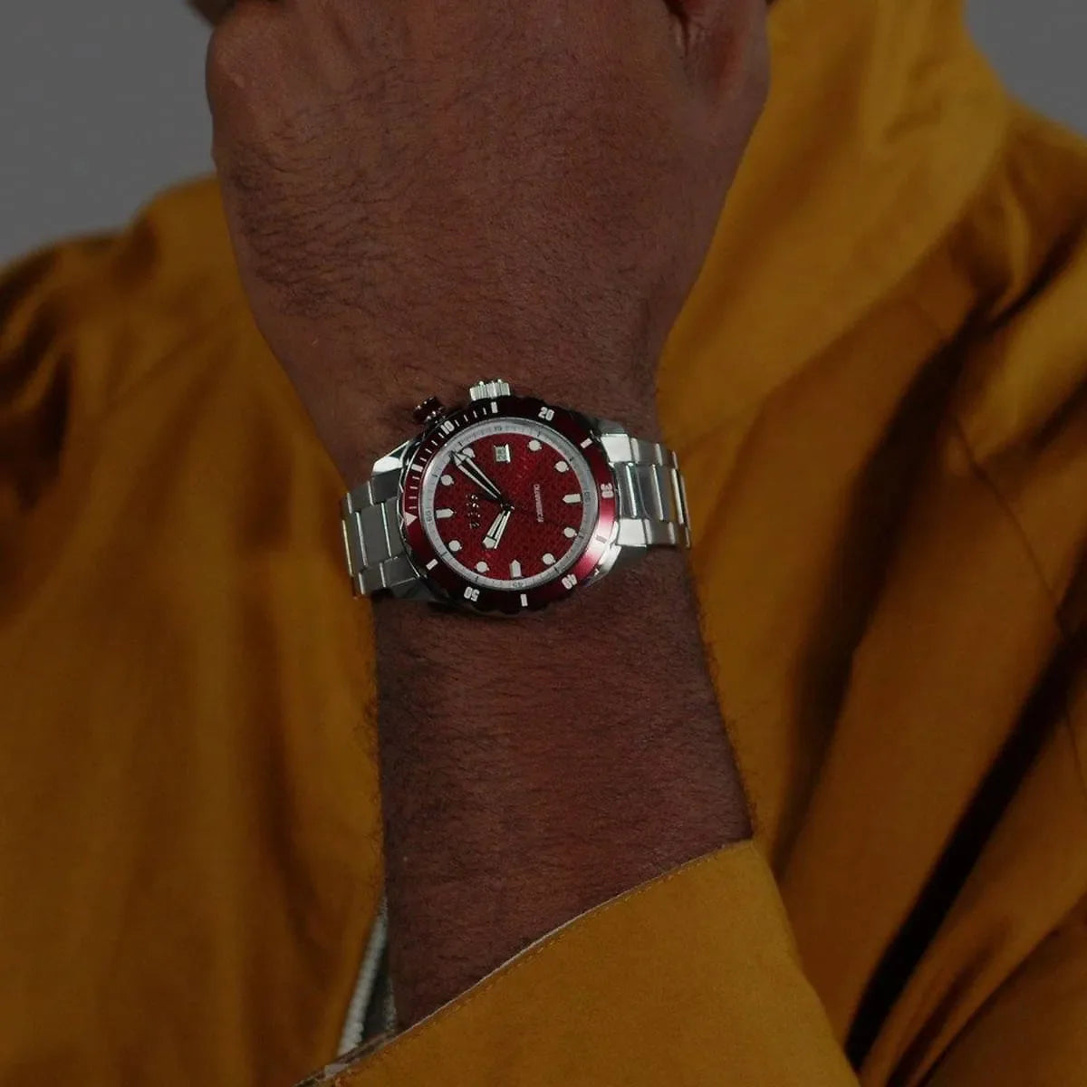 Hugo Boss Bossmatic watch on wrist with red dial and bezel