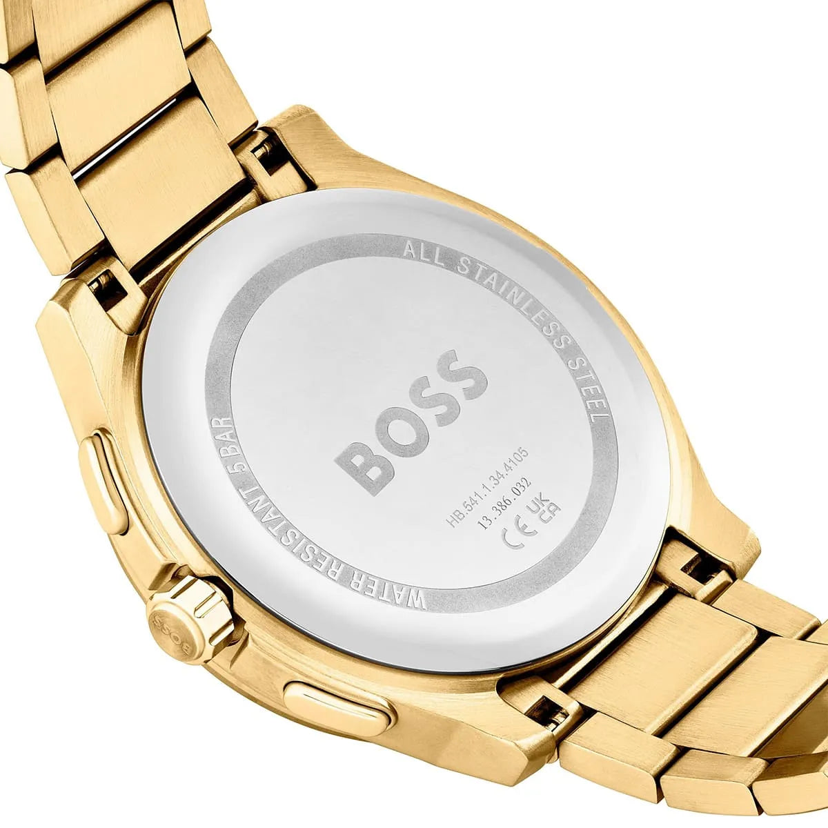 BOSS watch caseback detail with water resistant marking and gold steel bracelet