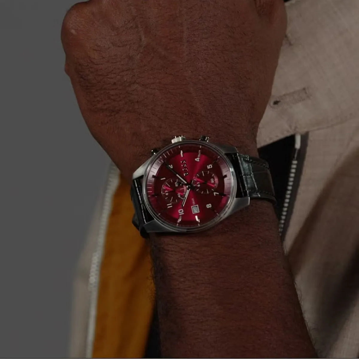 Hugo Boss Skymaster chronograph watch on wrist displaying time and date window