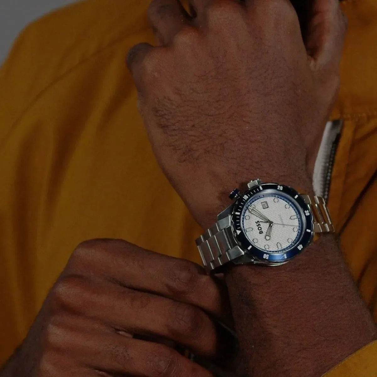 Hugo Boss Skymaster Quartz watch worn on wrist with yellow shirt