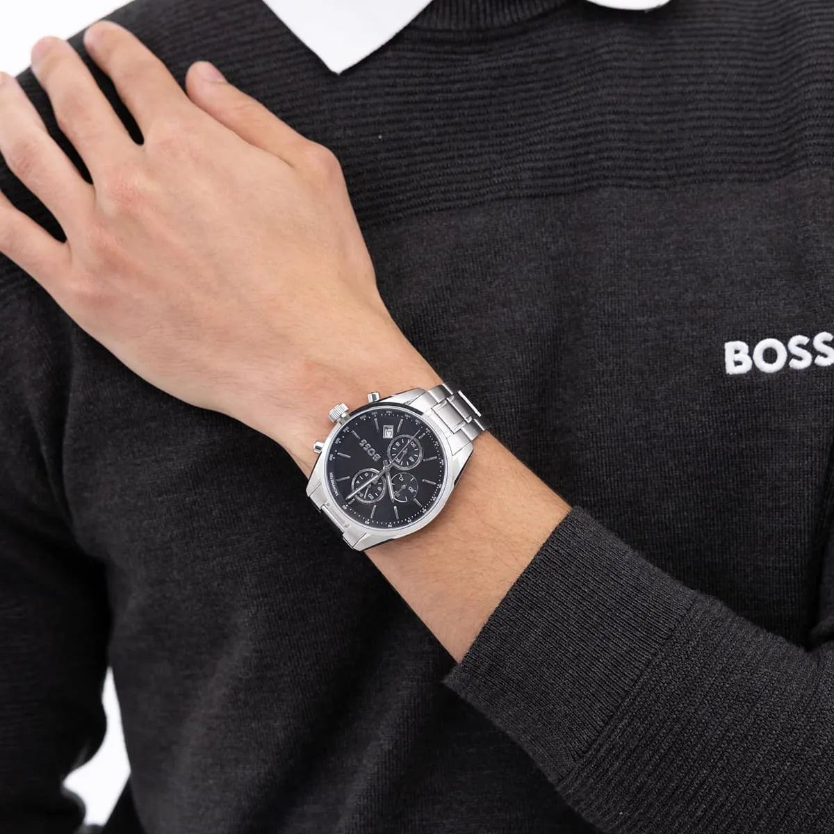 Hugo Boss Grand Prix chronograph watch on wrist showing side profile and steel bracelet fit