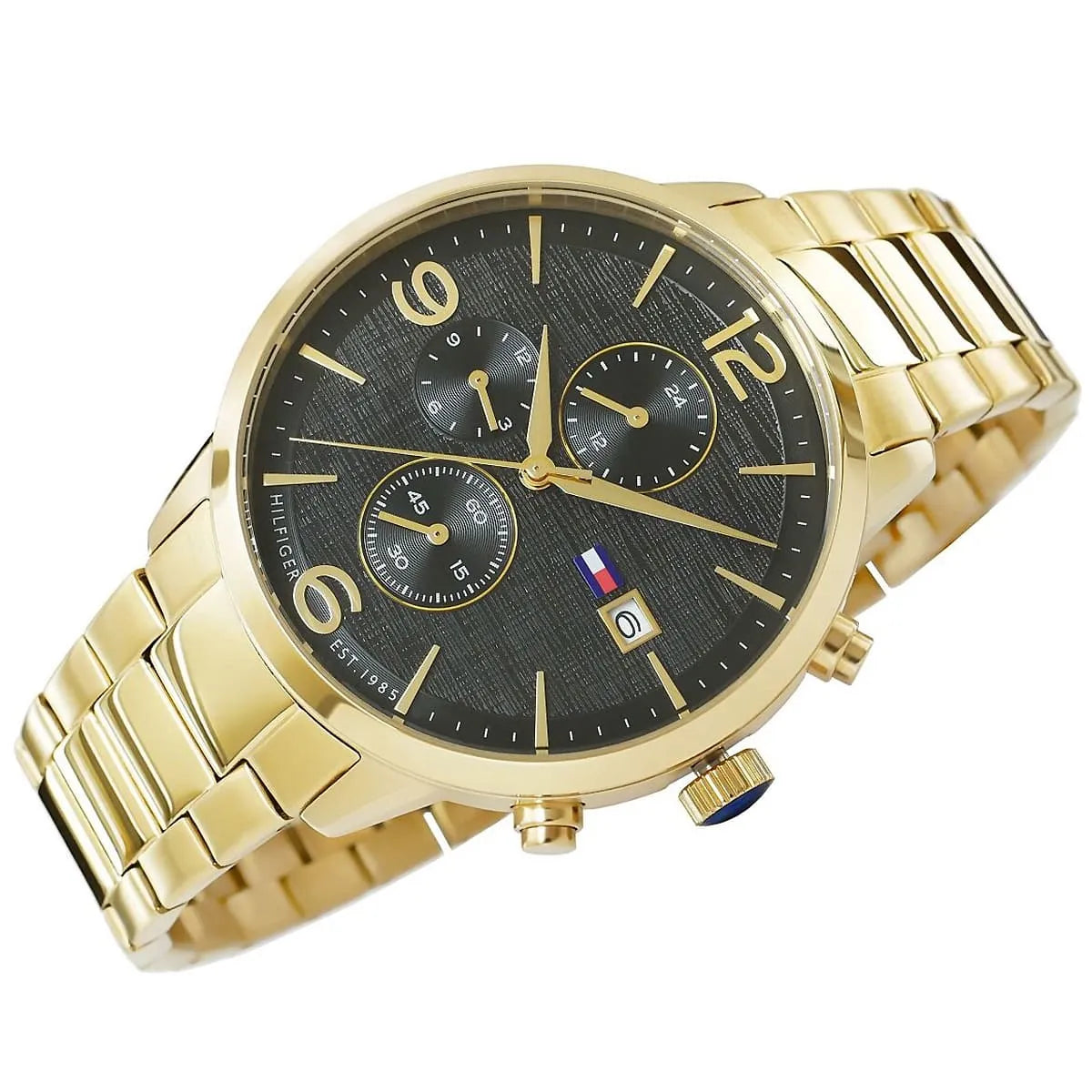 Tommy Hilfiger Liam chronograph watch worn on wrist, gold bracelet and black dial