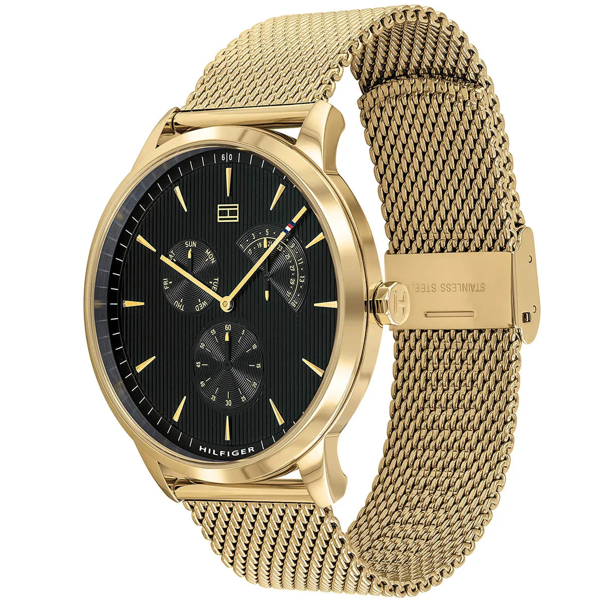 Tommy Hilfiger watch on wrist showing black dial and gold mesh bracelet