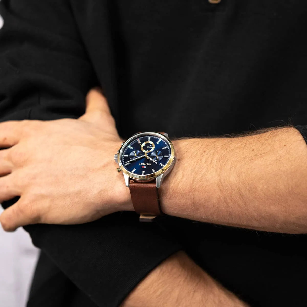 Tommy Hilfiger Ryder multifunction watch on male wrist, worn view