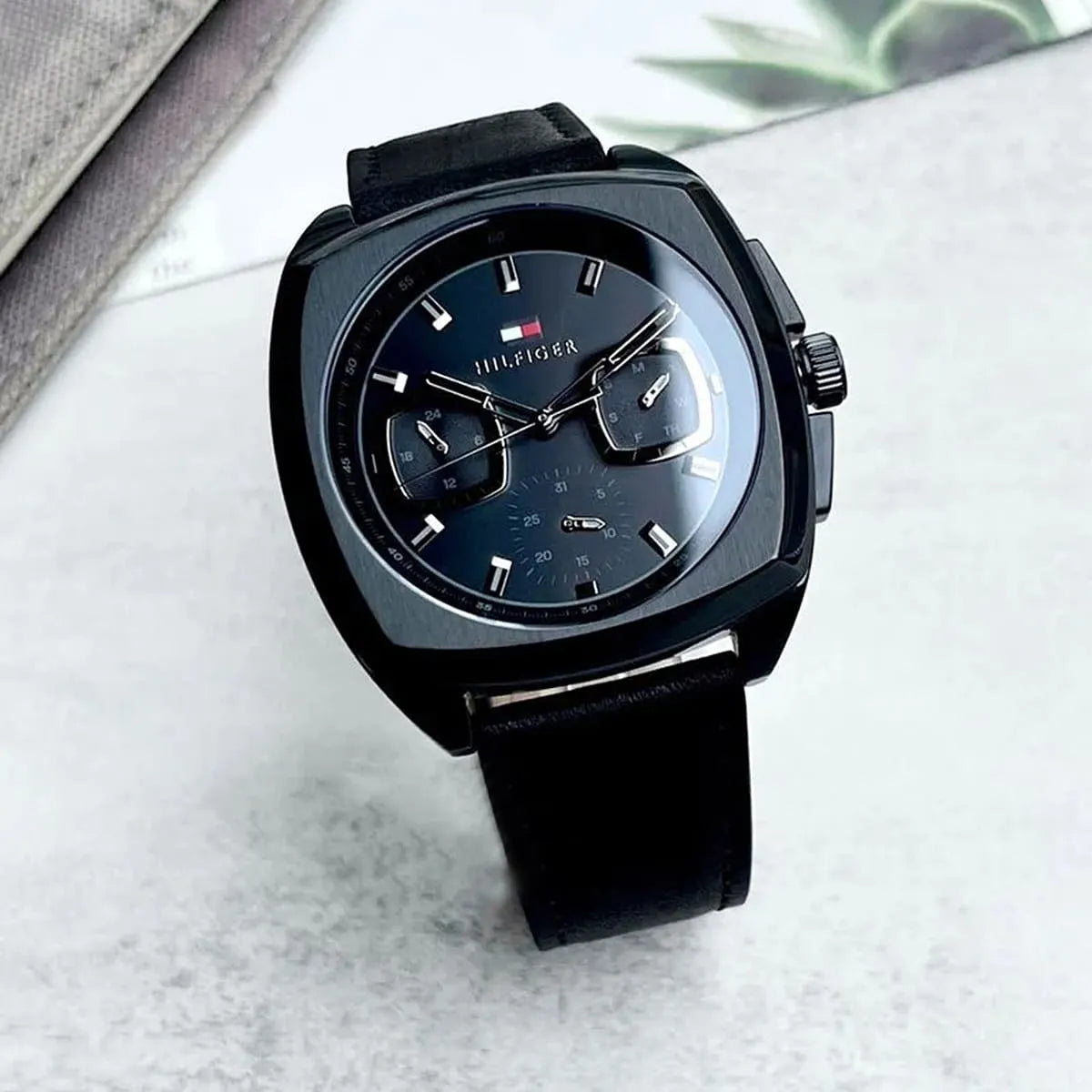 Tommy Hilfiger black dial watch with multifunction chronograph subdials and quartz movement
