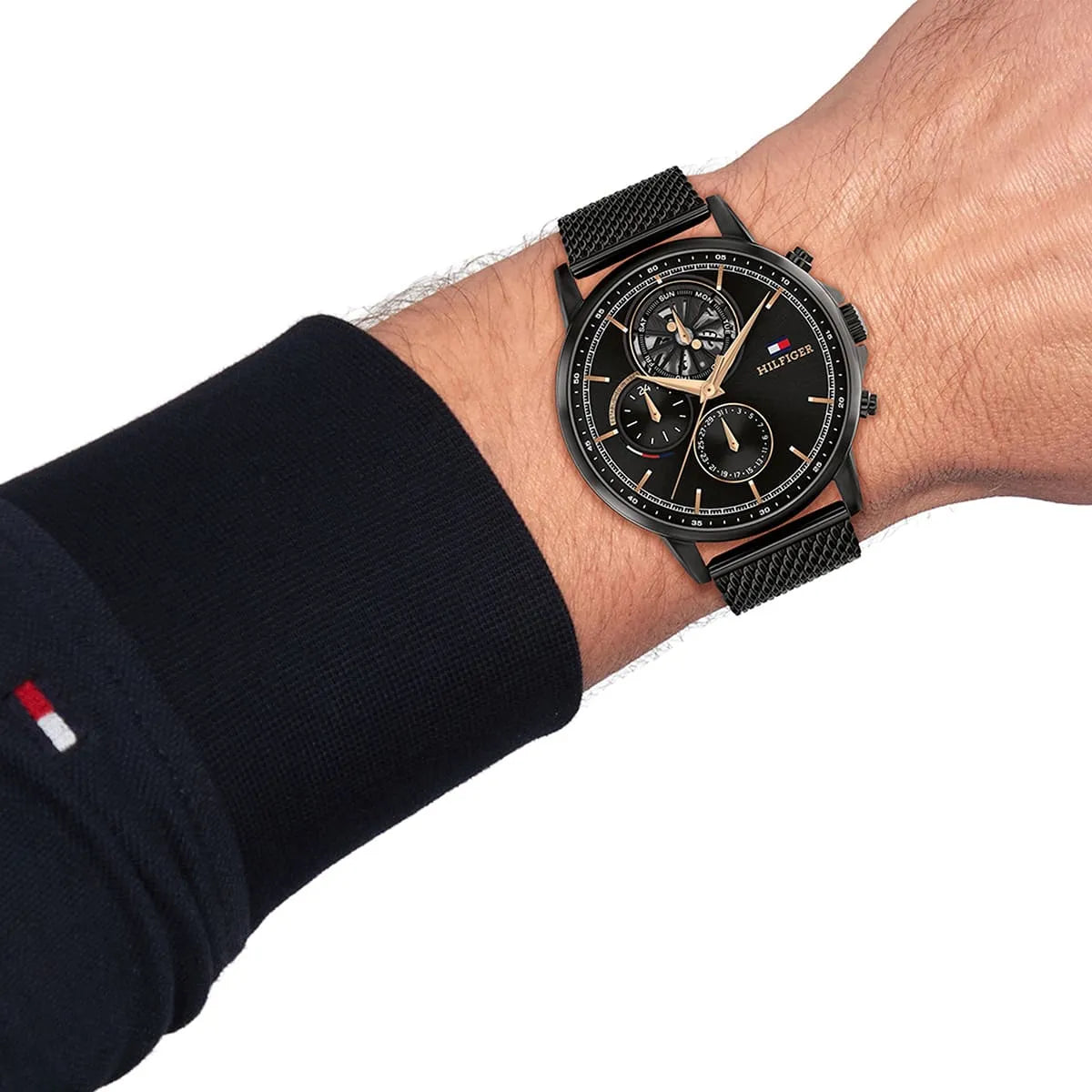 Tommy Hilfiger Stewart chronograph watch worn on wrist with black mesh strap