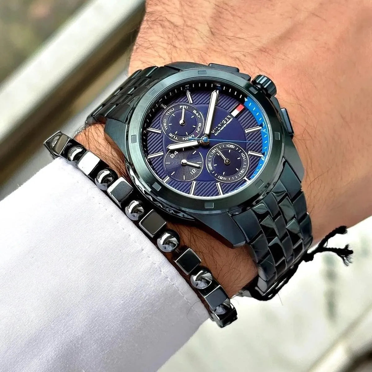 Tommy Hilfiger Damon chronograph watch worn on wrist with navy chronograph dial visible