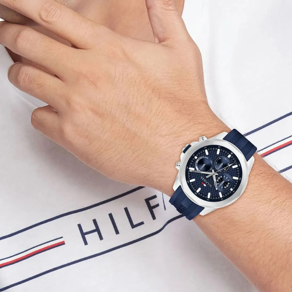 Tommy Hilfiger Lars chronograph watch worn on wrist with navy strap