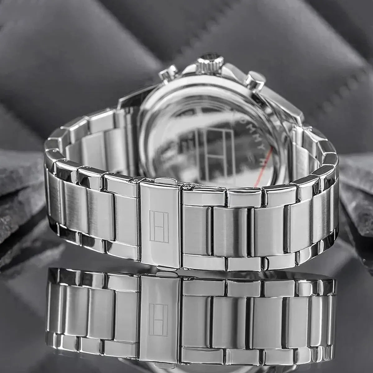 Tommy Hilfiger chronograph watch stainless steel link bracelet and caseback detail