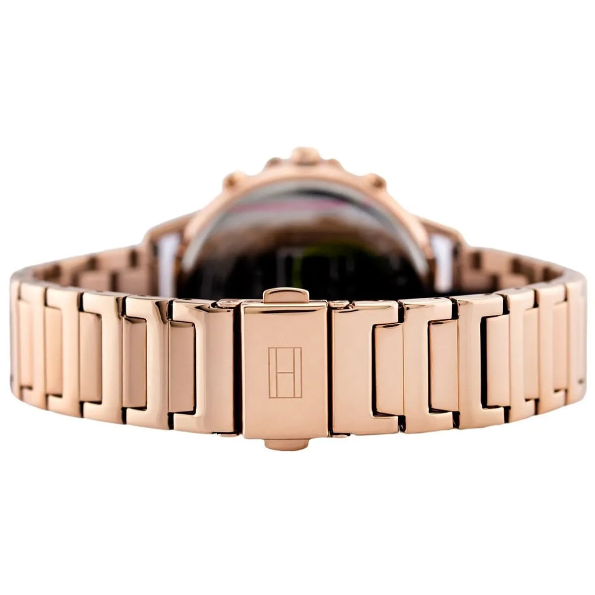 Back view of rose gold Tommy Hilfiger watch showing case back and fold-over clasp detail