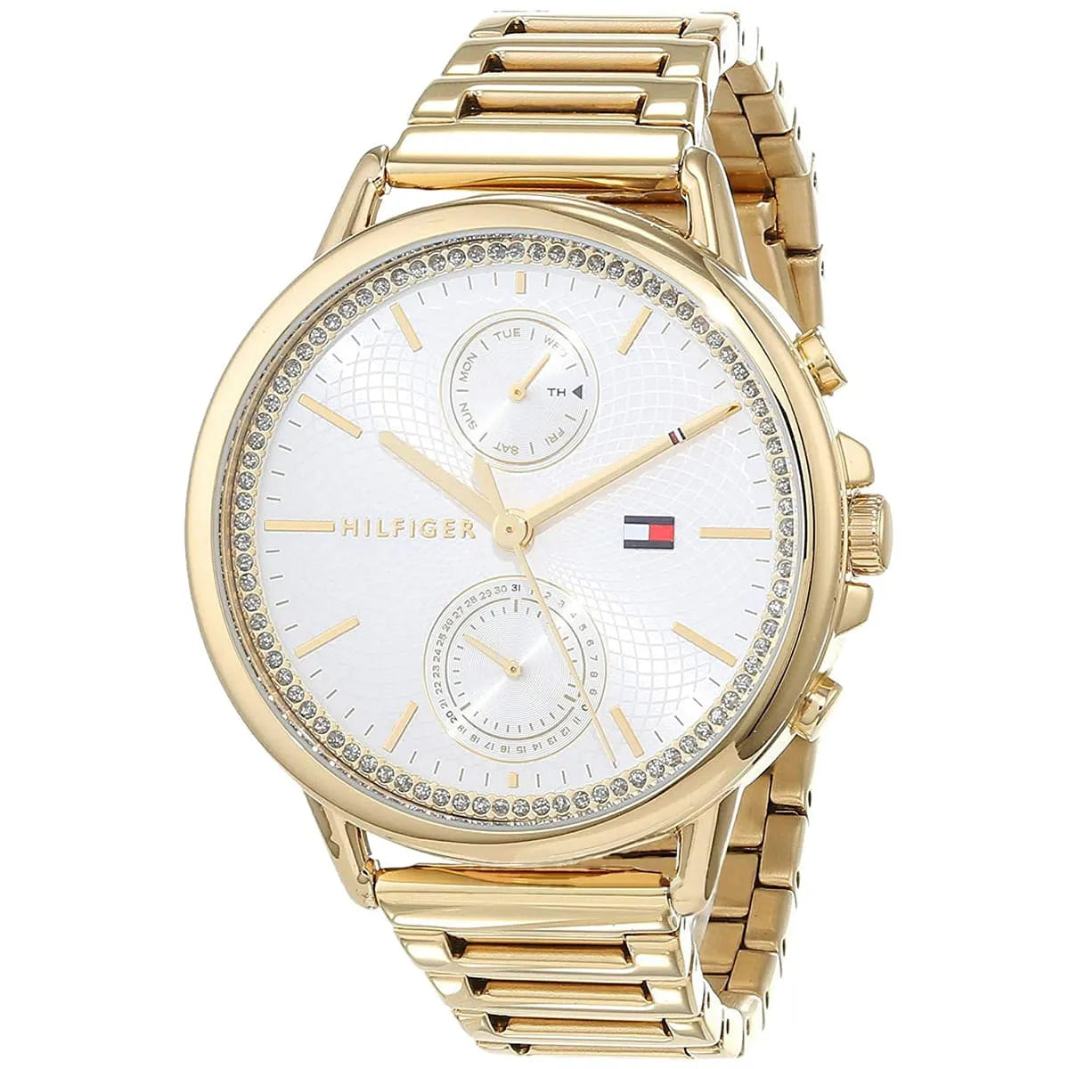Three-quarter view of Tommy Hilfiger women's watch showing silver dial and gold metal strap