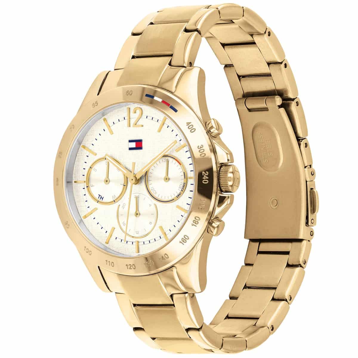 Tommy Hilfiger women's gold watch shown from angled side view with full bracelet visible